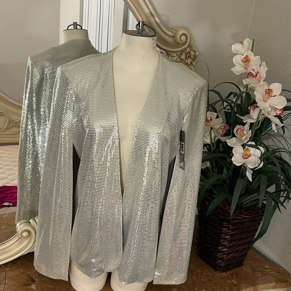 Metal. Cape Blazer for parties Can be dress up on top of the dress or by itself